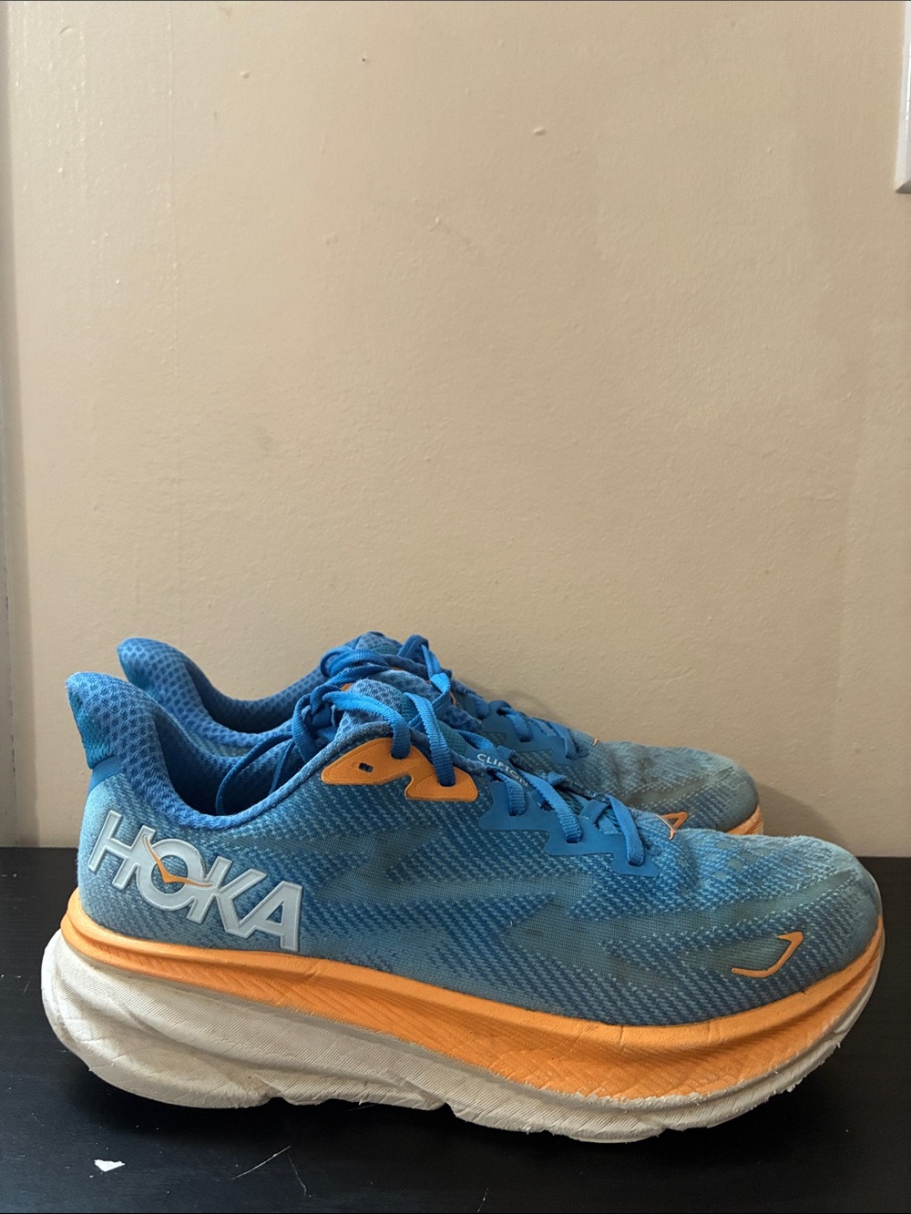 HOKA Clifton 9 running shoes in the Coastal Sky and All Aboard size 10